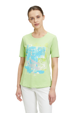 An image of a female model wearing the Betty Barclay Basic T-Shirt in the colour Green Mint.