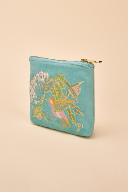 Powder Mini Velvet Pouch. A small, zip-up purse with a vibrant blue hummingbird design.