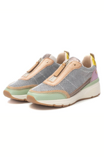 Carmela Trainer. A shiny, multicoloured leather trainer with non-slip sole.