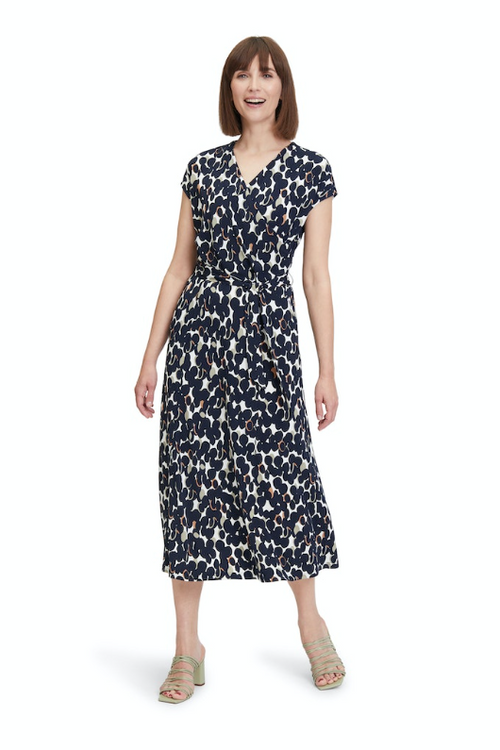 An image of the Betty Barclay Cross Over Dress with eye-catching print design.