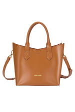 Every Other Twin Strap Grab Bag. A tan faux leather bag with top handles, crossbody strap and removable pouch.