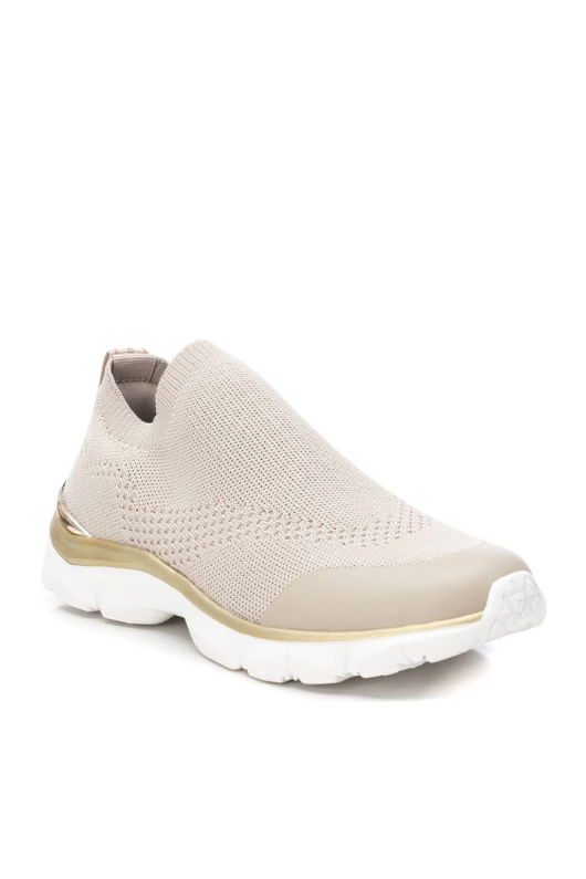 Xti Slip-On Trainer. A sock-style, women's sneaker with a back pull for easy put on, a non-slip rubber sole, a beige mesh upper and gold detail on the sole