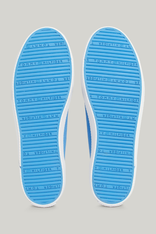 An image of the Tommy Hilfiger Enamel Flag Canvas Trainers