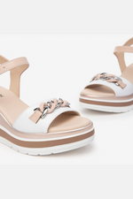 An image of the Nero Giardini Leather Wedge Sandals in the colour White.