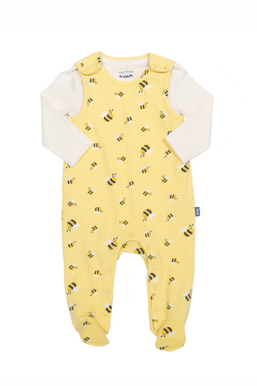 Kite Dungarees. A 2 piece set with cream bodysuit and yellow bumblebee print dungarees. The dungarees feature convenient popper closures.