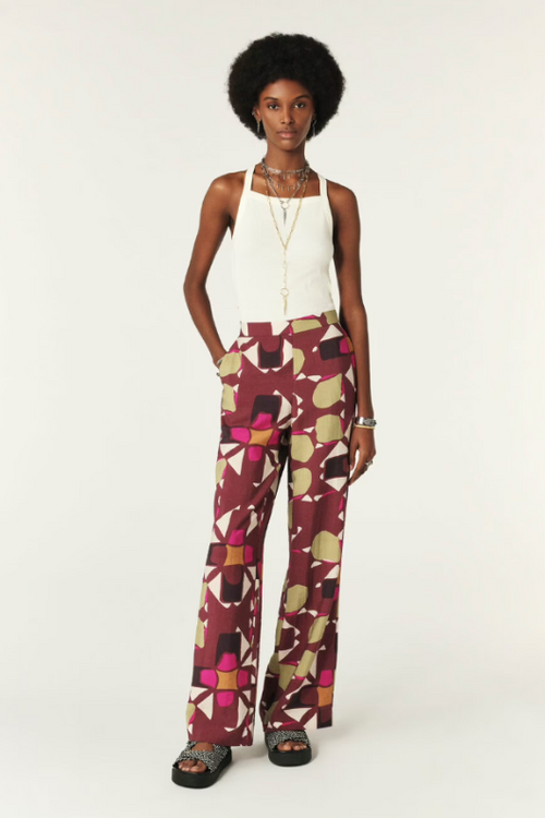 An image of a female model wearing the BA&SH Aaron Wide Leg Trousers in the colour Purple.