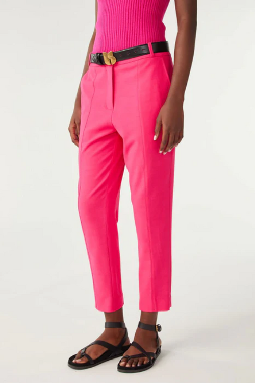 An image of a female model wearing the BA&SH Club Trousers in the colour Pink.