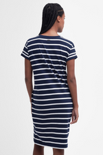 An image of a female model wearing the Barbour Otterburn Striped Midi Dress in the colour Navy/White.