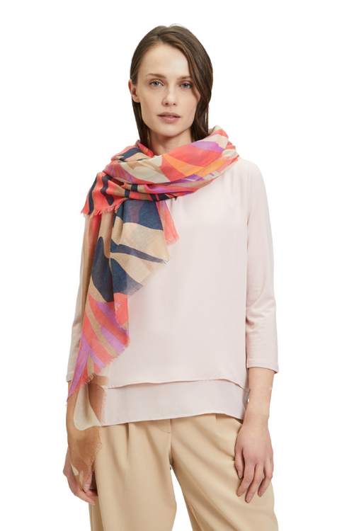 An image of a model wearing the Betty Barclay Scarf in the colour Red/Beige.