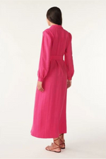 An image of a female model wearing the BA&SH Lara Shirt Dress in the colour Fuchsia.