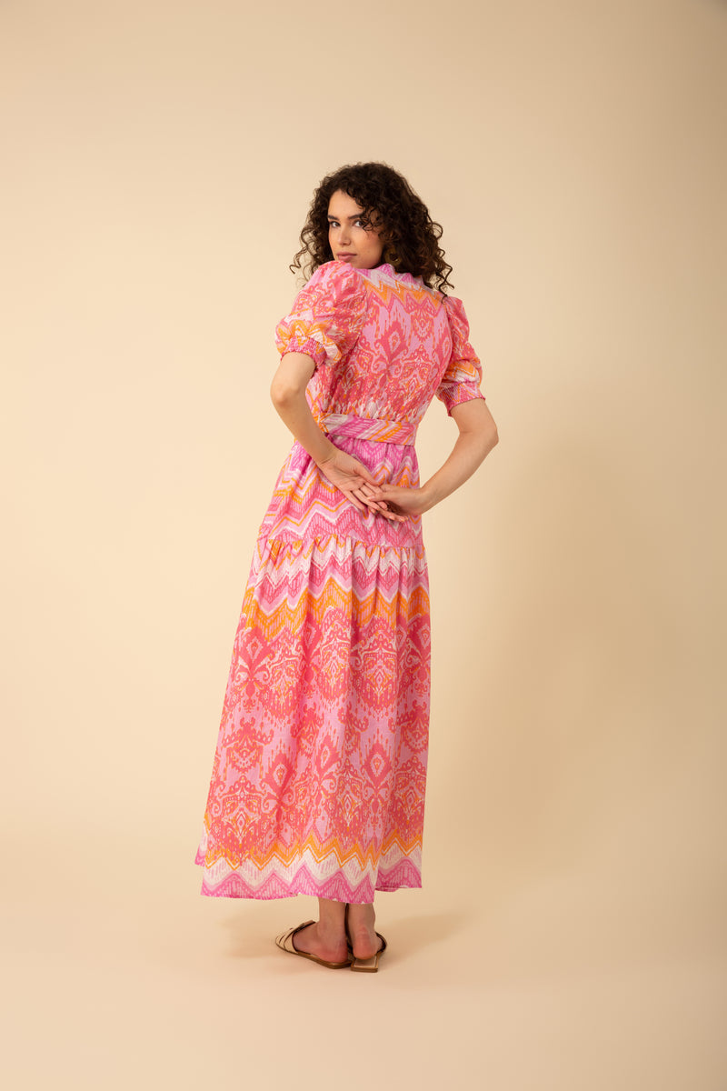 An image of a model wearing the Hale Bob Sydney Linen Maxi Dress in the colour Pink