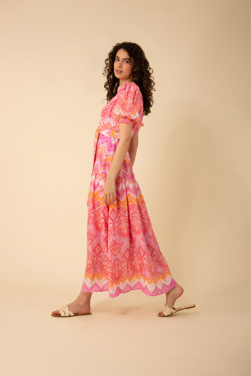 An image of a model wearing the Hale Bob Sydney Linen Maxi Dress in the colour Pink