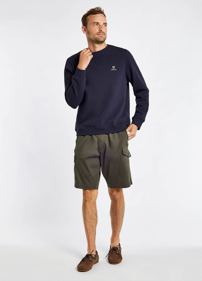 Dubarry Spencer Sweatshirt. A regular fit navy sweatshirt with long sleeves, crew neck and logo embroidery.