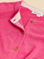 White Stuff Lulu Cardi in Mid Pink. A regular fit cardigan with a crew neck, button fastening and subtle ribbed detail.
