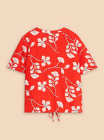 White Stuff Ferne Linen Blend Shirt. A relaxed fit top with short sleeves and notch neck in a bold red and white floral print.