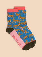 White Stuff Cheetah Ankle Socks with a colourful cheetah design, black toe and heel, and White Stuff printed on the sole