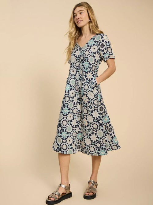 White Stuff Ivy Linen Midi Dress. A regular fit, midi length dress with short sleeves and V-neckline in a multicoloured blue bold print.
