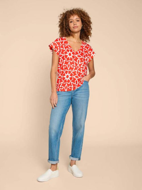 White Stuff Ivy Linen V-Neck Tee. A relaxed fit T-shirt with short sleeves and V-neck in an eye-catching red print.