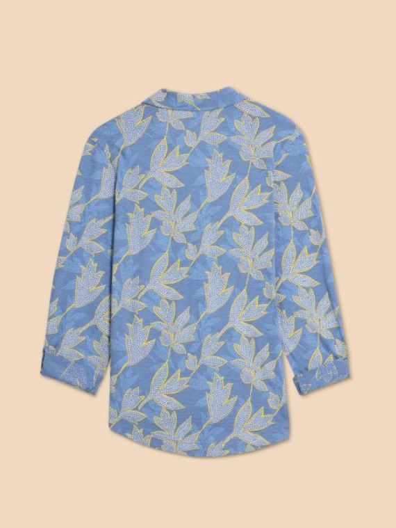 White Stuff Annie Printed Cotton Shirt. A slim-fit, women's shirt with a V-neck, button fastening and a leafy design on a blue background.