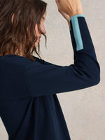 An image of the White Stuff Olive Jumper