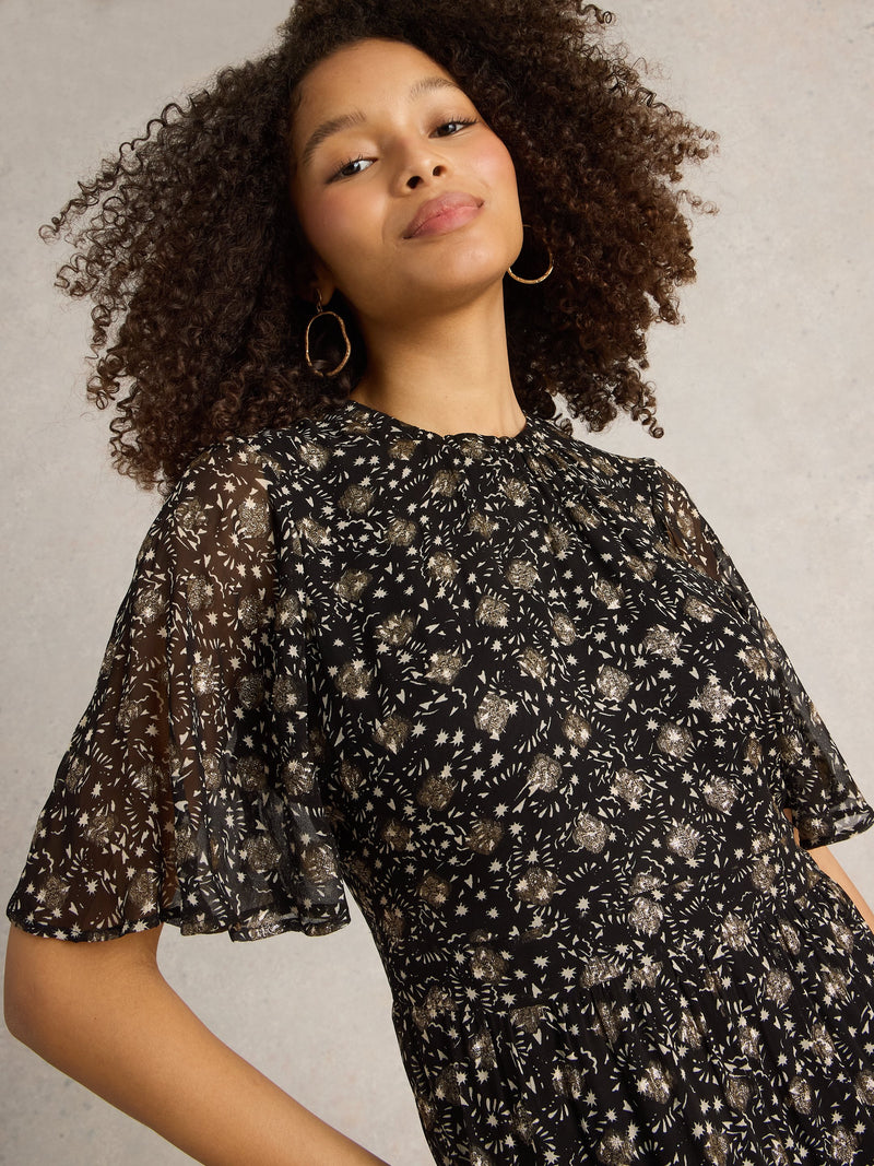 An image of the White Stuff Erin Metallic Dress