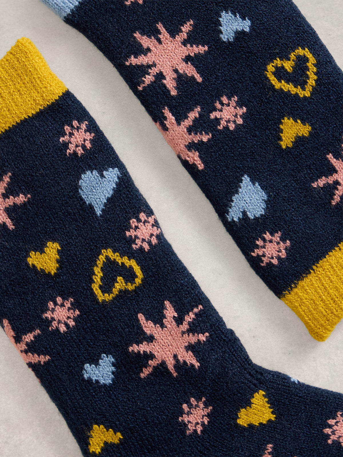 An image of the White Stuff Stars And Hearts Cabin Socks