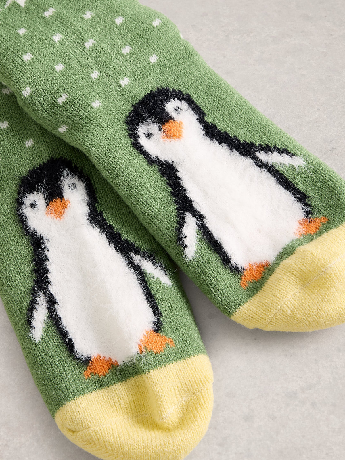 An image of the White Stuff Fluffy Penguin Cabin Socks