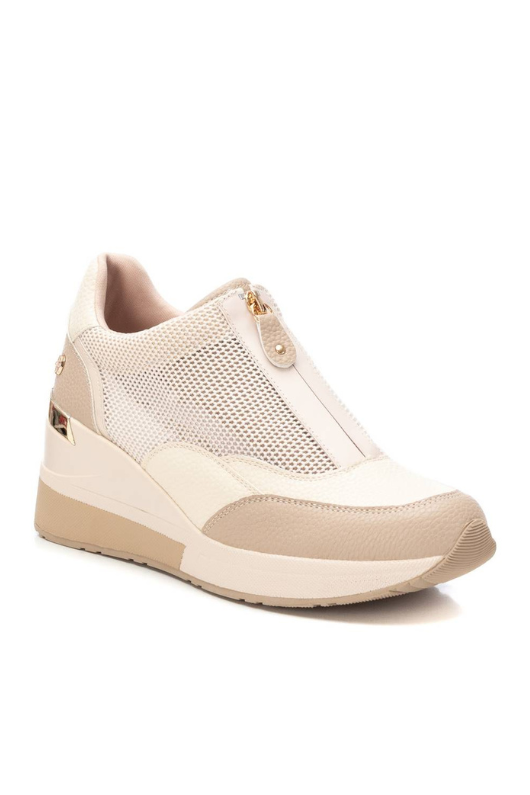 Xti Wedged Trainer. A women's trainer with mesh detail, metal zip closure, 7cm wedge and a non-slip rubber sole.
