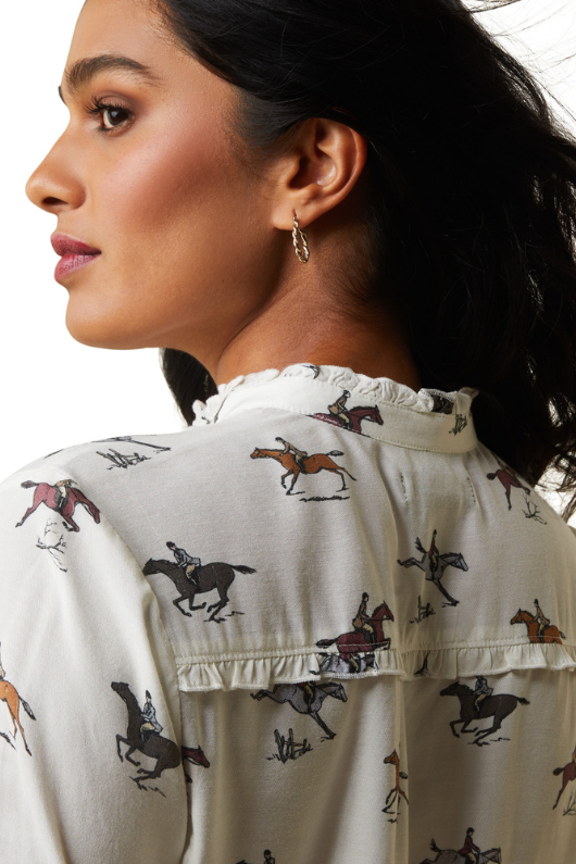 An image of a female model wearing the Ariat Clarion Blouse in the colour Fresh Print.