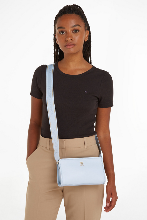 An image of the Tommy Hilfiger Monotype Tonal Logo Small Crossover Bag in the colour Breezy Blue