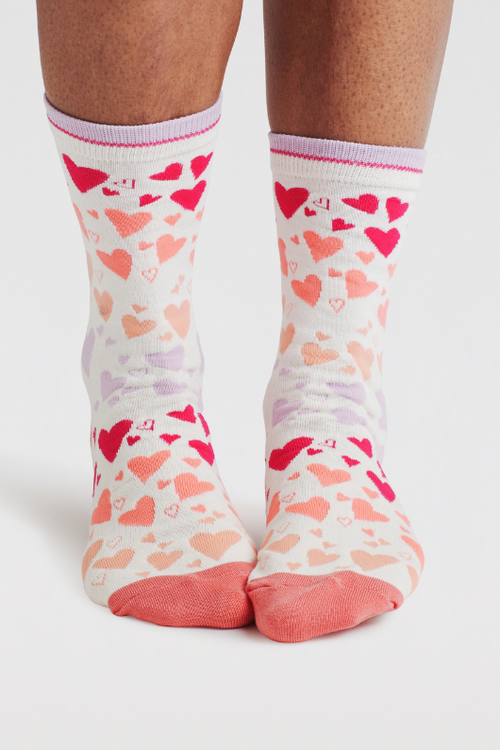 An image of the Thought Socks Eva Heart Scatter Bamboo Socks in the colour Earthy Pink.