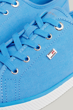 An image of the Tommy Hilfiger Enamel Flag Canvas Trainers in the colour Blue Spell.