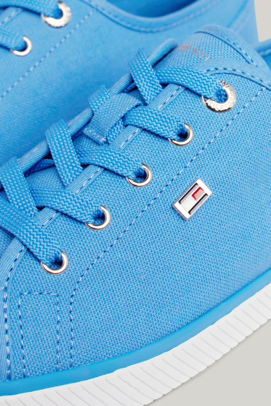 An image of the Tommy Hilfiger Enamel Flag Canvas Trainers