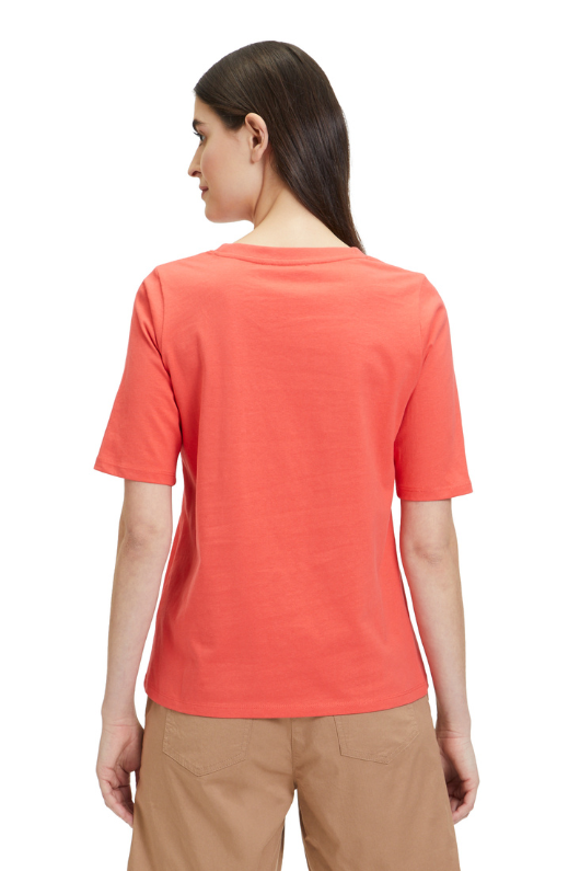 An image of a model wearing the Betty Barclay Plain T-Shirt in the colour Cayenne.