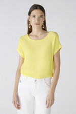 Oui Plain Cap Sleeve T-Shirt. A yellow top with short sleeves, wide neck, and split hem.