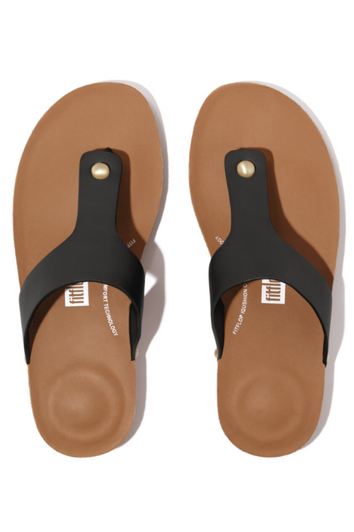 Fitflop iQushion Leather Toe Post Sandal. A pair of lightweight sandals wish cushioned sole, arch support, black leather T-bar design featuring metal studs, and cork sole.