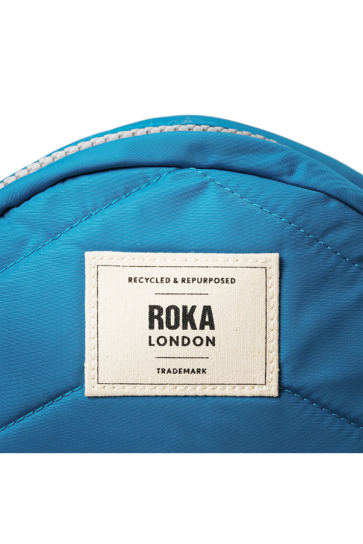 An image of the Roka London Paddington B Crossbody Bag in the colour Seaport.