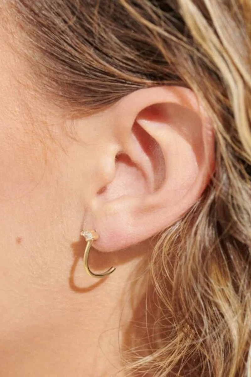 An image of the Joma Jewellery Style Stories Eye Hoop Earrings