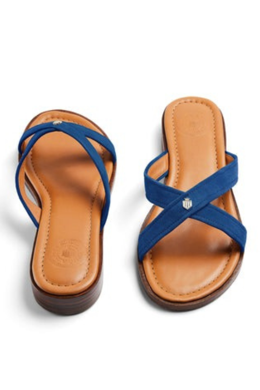 Fairfax & Favor Holkham Suede Sandal. A pair of Porto Blue sandals with cross over straps, gold hardware, 2cm heel, and padded insole