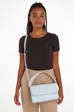 An image of the Tommy Hilfiger Monotype Flap Small Shoulder Bag in the colour Breezy Blue.