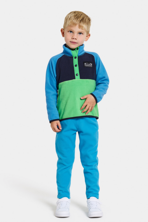 Didriksons Monte 3 Button Fleece. A boys mid-layer sweater in a green & blue design and a button placket, elastic binding on the sleeve and a thermal, microfleece finish.