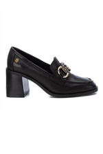 Carmela Heeled Leather Loafer. A pair of 7cm heeled black loafers with buckle detail.