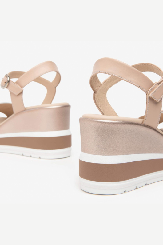 An image of the Nero Giardini Leather Wedge Sandals in the colour White.