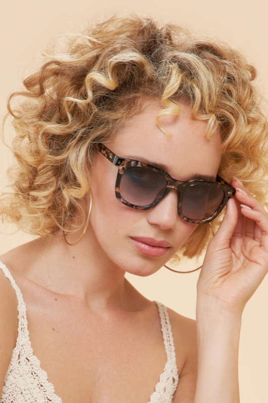 Powder Katana Sunglasses. Classic shape sunglasses with light & dark specs on the frame.