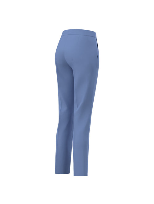 Emme Edile Trouser. A slim fit trouser with regular waist, belt loops and zip/button closure, in the colour light blue.