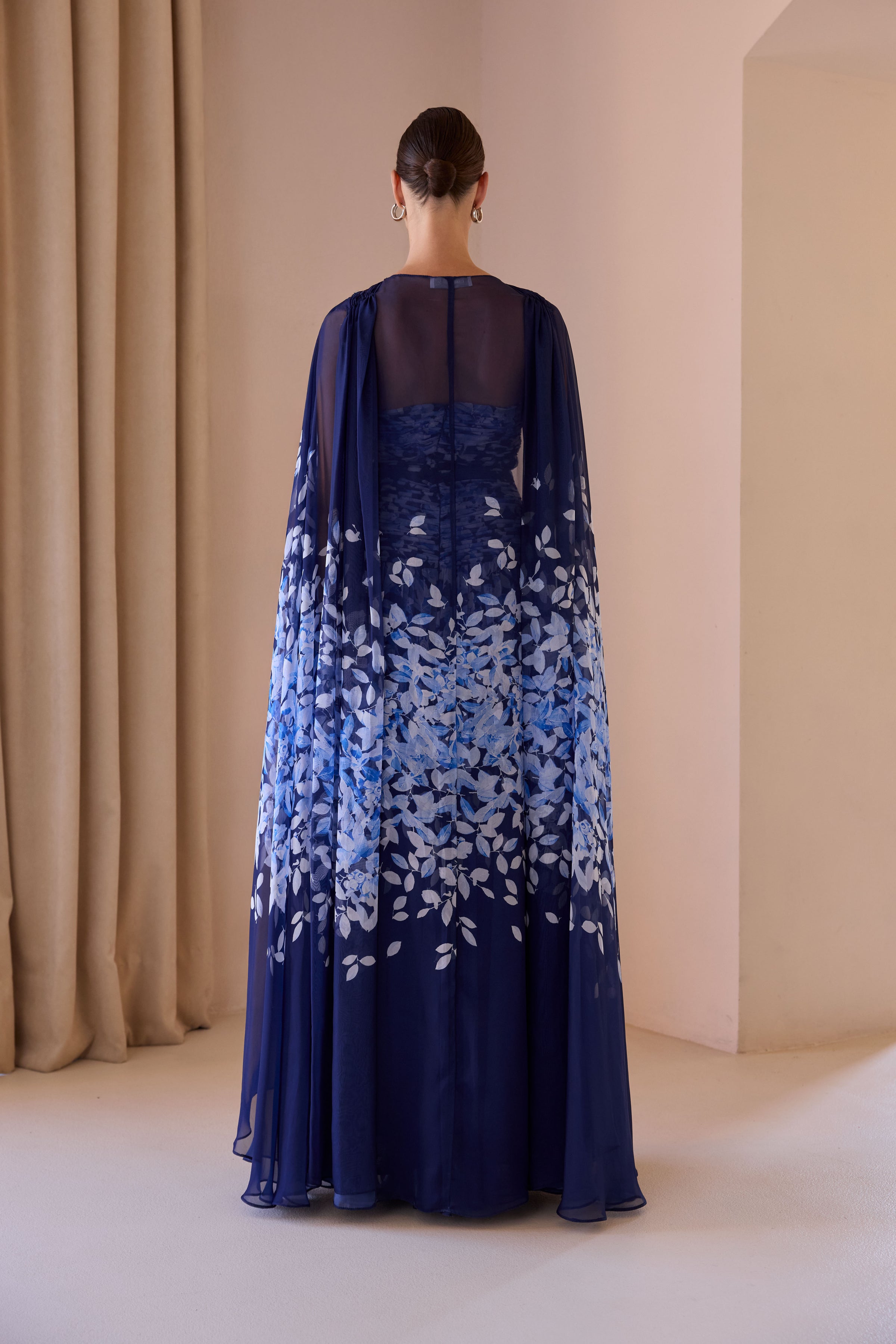 An image of the Carla Ruiz Long Dress With Cape