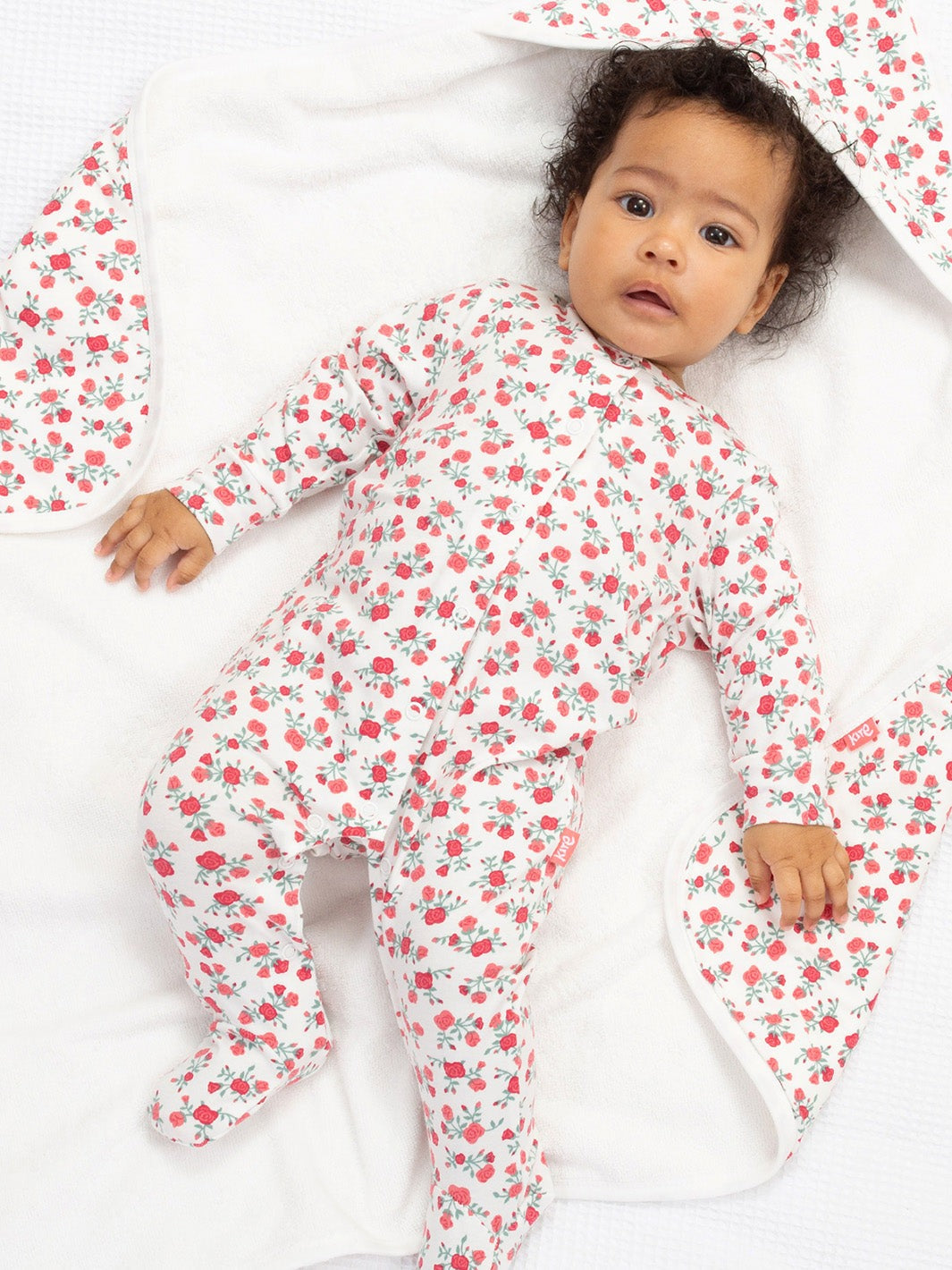 An image of the Kite Rosey Posey Sleepsuit