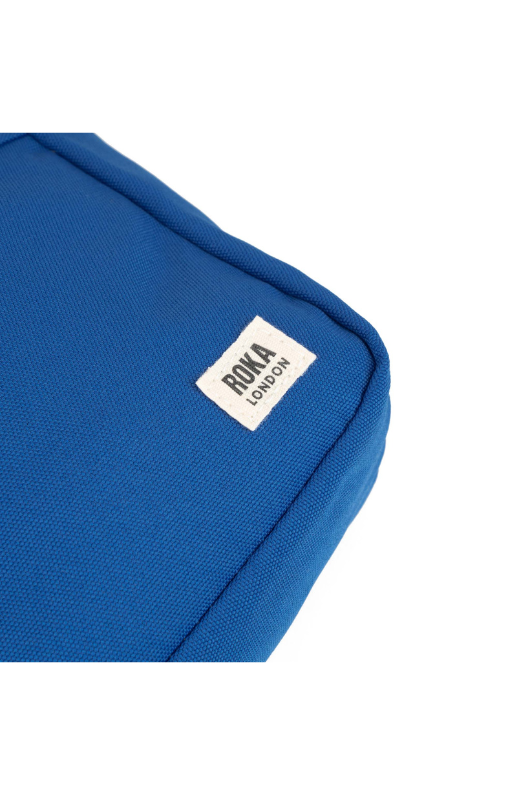 An image of the Roka London Bond Galactic Blue Recycled Canvas Crossbody Bag.