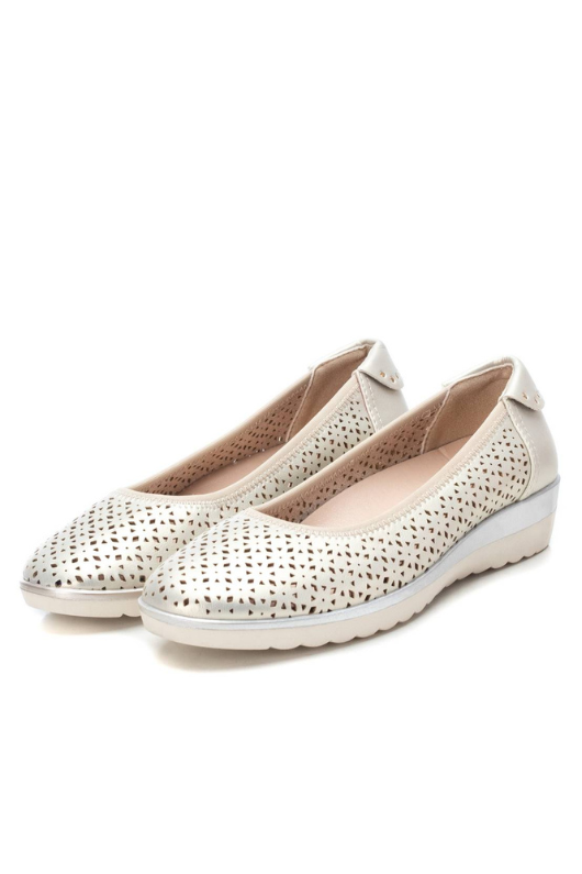 Xti Wedge Shoe. A women's ballerina shoe with a non-slip rubber sole, a slight wedged heel and a pretty, silver die-cut design.