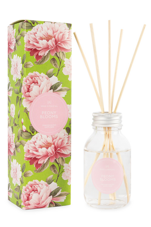 A reed diffuser with floral packaging, with notes of peony, rose, mandarin, and amber.